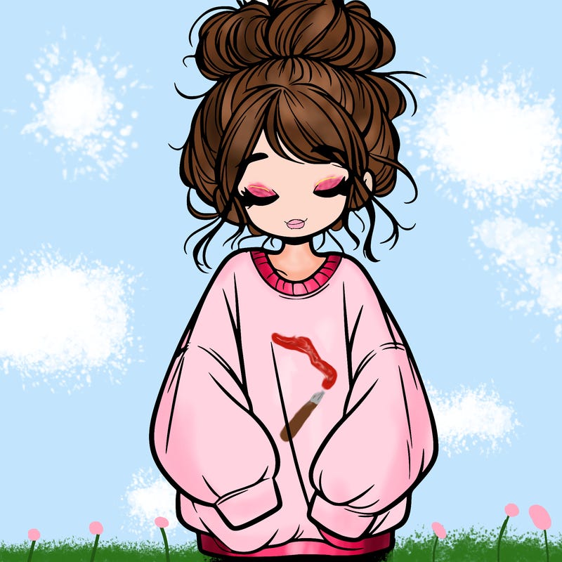 girl with baggy sweatshirt and messy bun