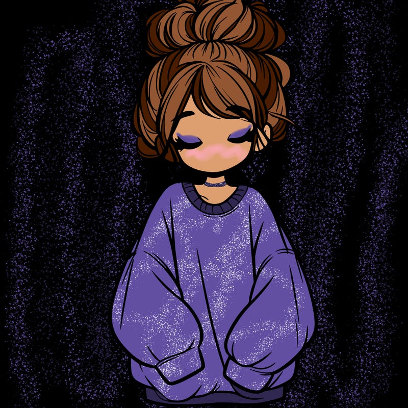 girl with baggy sweatshirt and messy bun