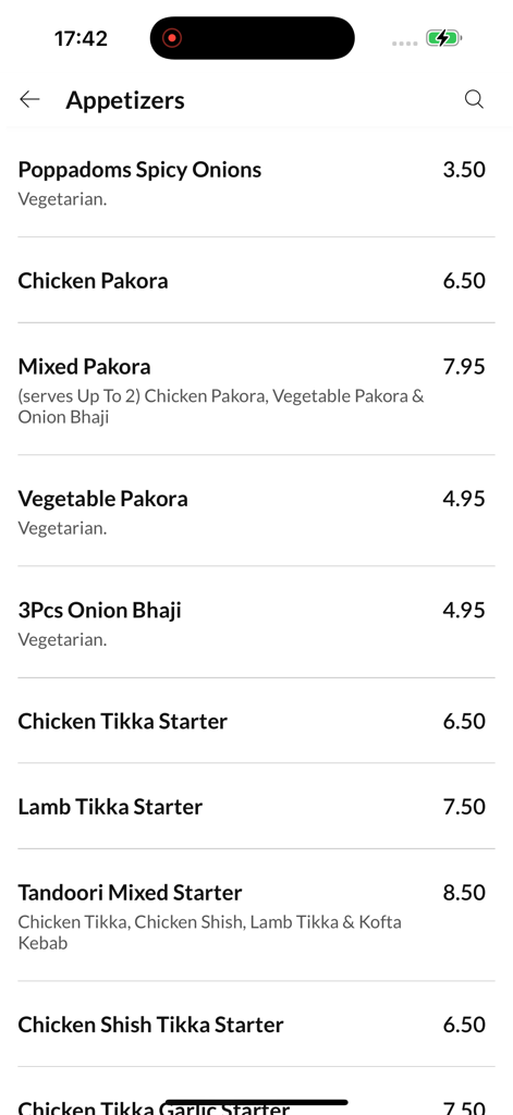 Azaad. - A menu screen from the Azaad app listing various Indian appetizers including pakora and tikka