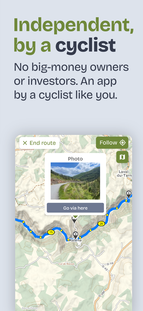 cycle.travel app interface showing a cycling route on a map with a scenic road photo