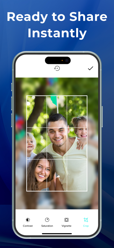 Photo Scanner . - Interface of the Photo Scanner app showing a family photo being cropped with editing tools like contrast and saturation