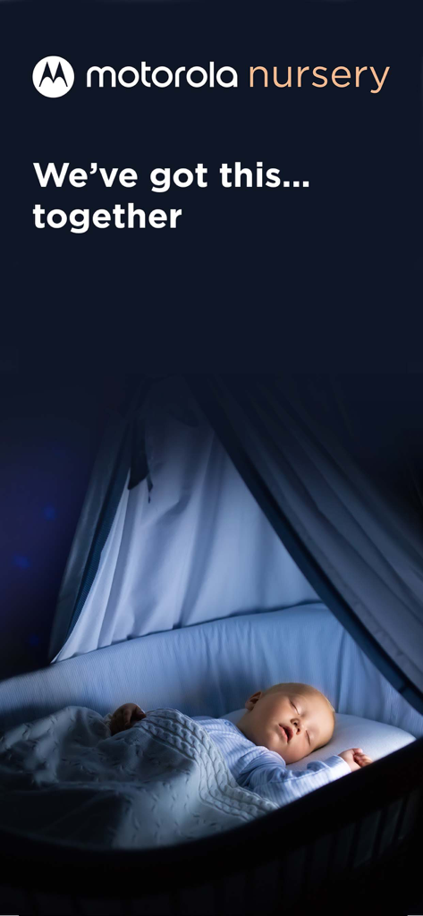 A peaceful sleeping baby in a crib with the Motorola Nursery logo and slogan