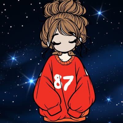 girl with baggy sweatshirt and messy bun