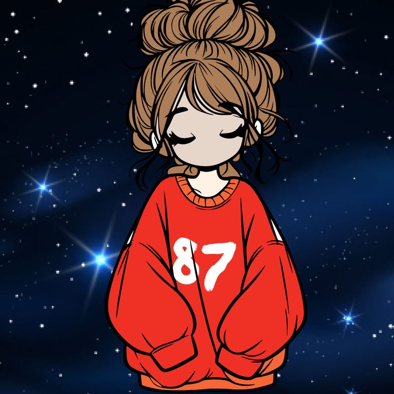 girl with baggy sweatshirt and messy bun