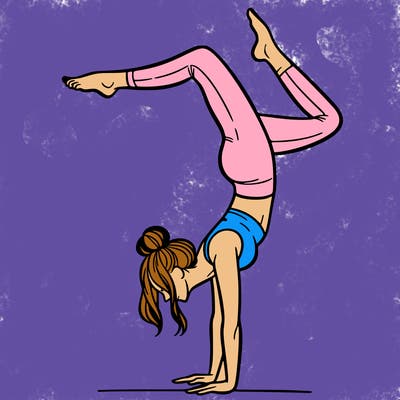 a woman doing a handstand