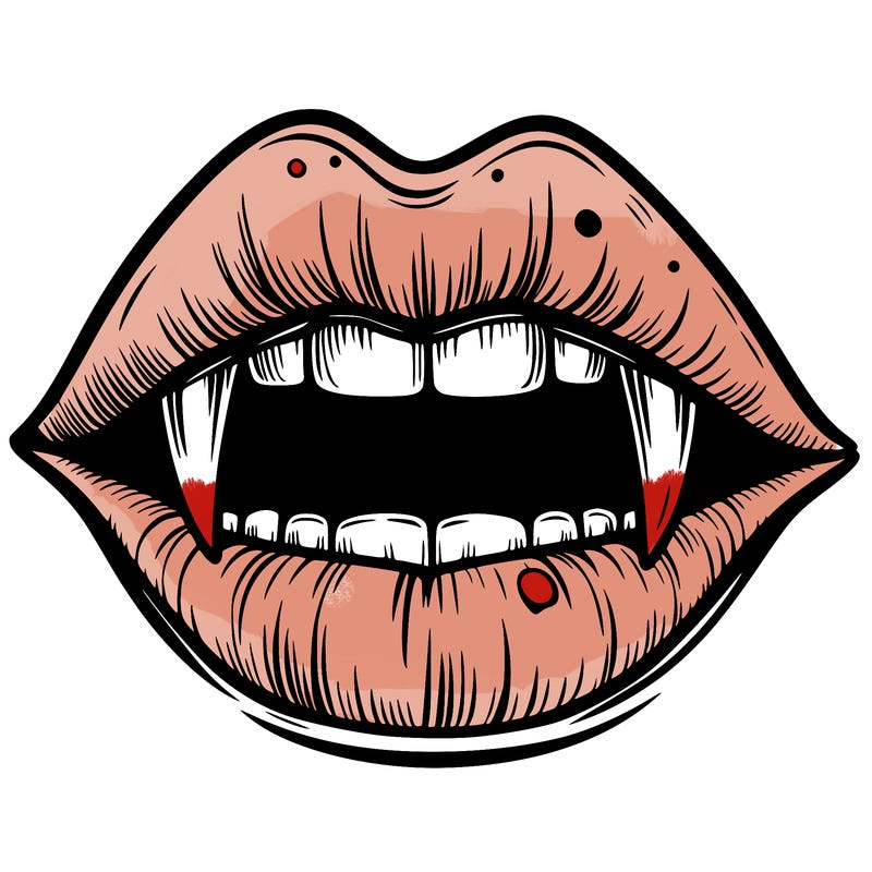 lips with vampire teeth