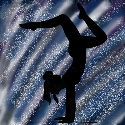 a woman doing a handstand