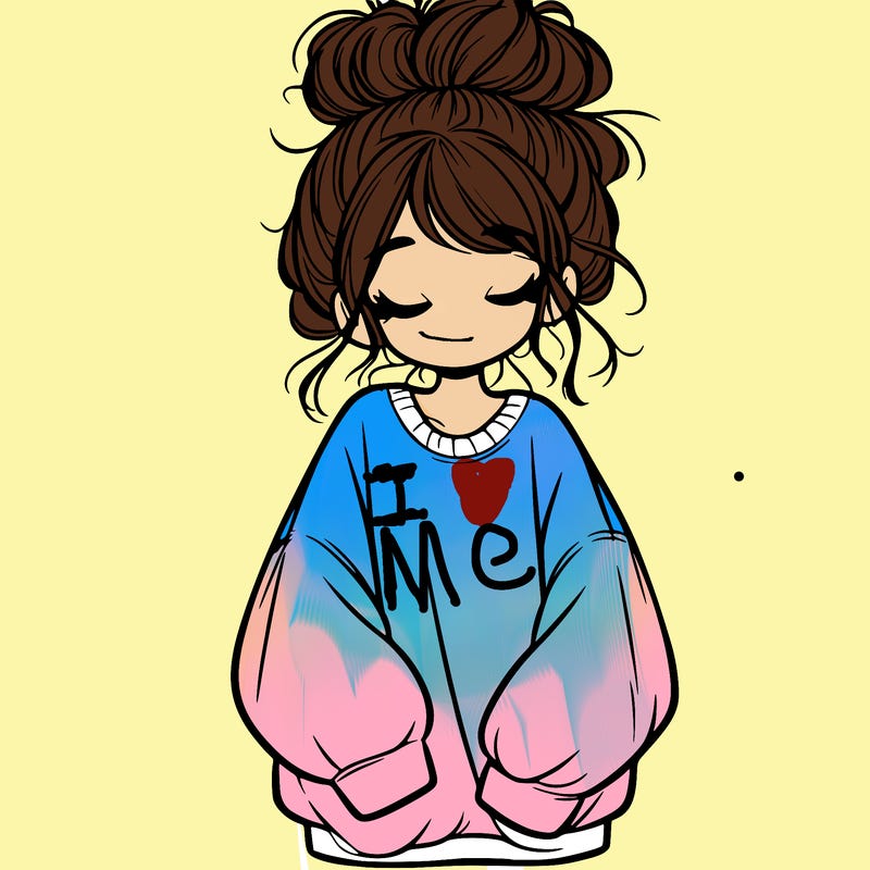 girl with baggy sweatshirt and messy bun
