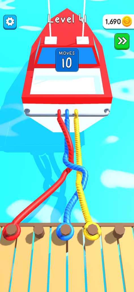 A level in the Hyper Boat mobile game where a player must untangle red blue and yellow ropes to dock a boat