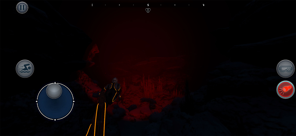 Beyond Blue - Um mergulhador de profundidade nadando através de uma caverna subaquática escura com uma luz vermelha em Beyond Blue.