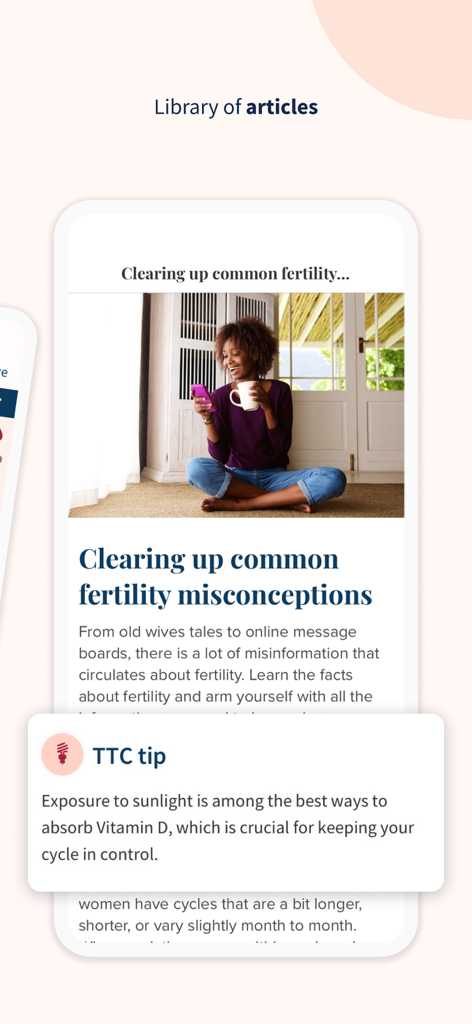 Ovia app screen showing a fertility article and a daily TTC tip about Vitamin D.