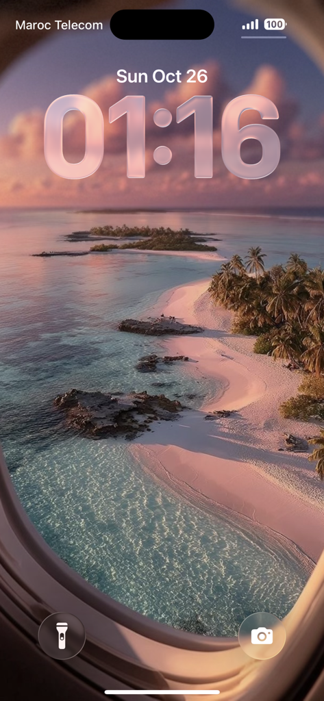 High resolution beach wallpaper through an airplane window on an iPhone lock screen