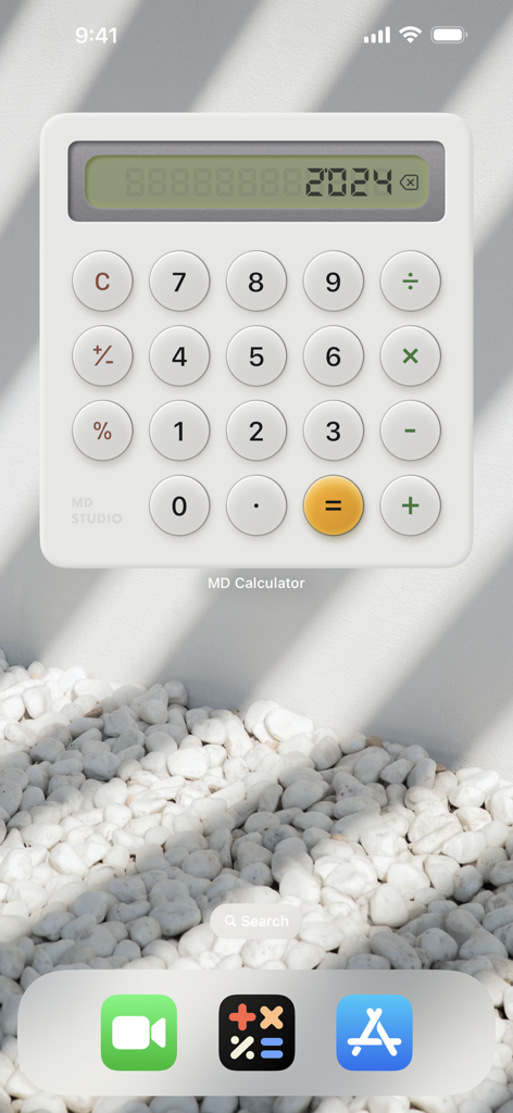MD Calculator - MD Calculator interactive skeuomorphic widget on an iPhone home screen