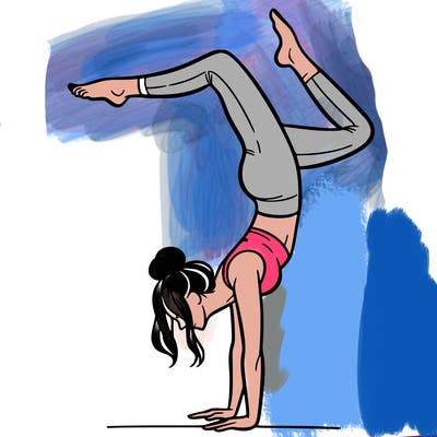 a woman doing a handstand