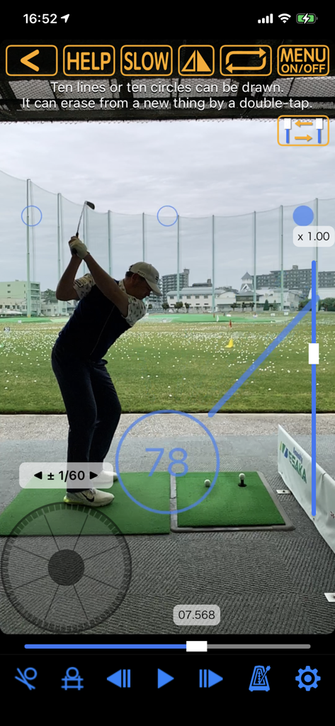 Golf Swing Check - Slow Movie - Screenshot of the Golf Swing Check app displaying swing analysis with lines and tempo metrics on a driving range