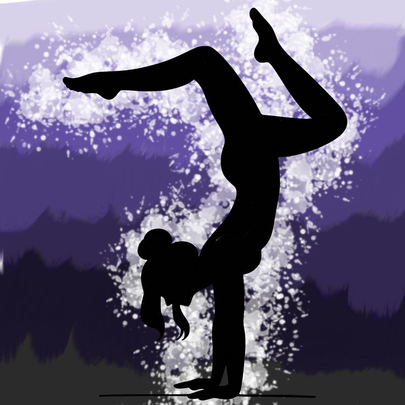 a woman doing a handstand