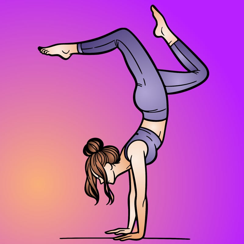 a woman doing a handstand