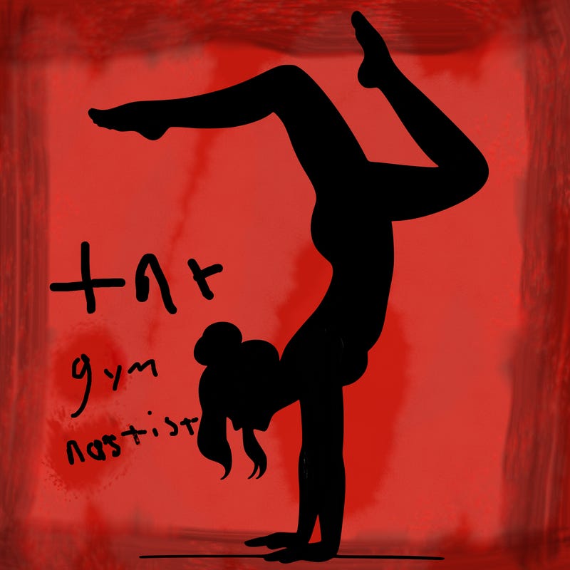 a woman doing a handstand