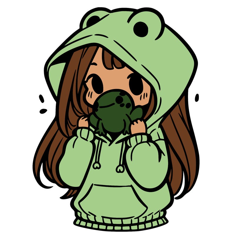 a girl holding a froggy hoodie