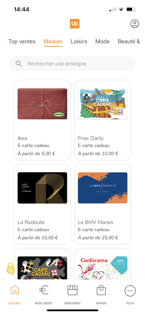 Up Cadeaux - Capture d'écran de l'application Up Cadeaux montrant une sélection de cartes cadeaux électroniques pour des marques comme Ikea, Fnac Darty et La Redoute dans la catégorie maison.