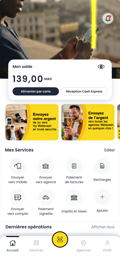 Pantalla de inicio de la aplicación myWafacash que muestra el saldo de la cuenta y servicios financieros como transferencia de dinero y pago de facturas