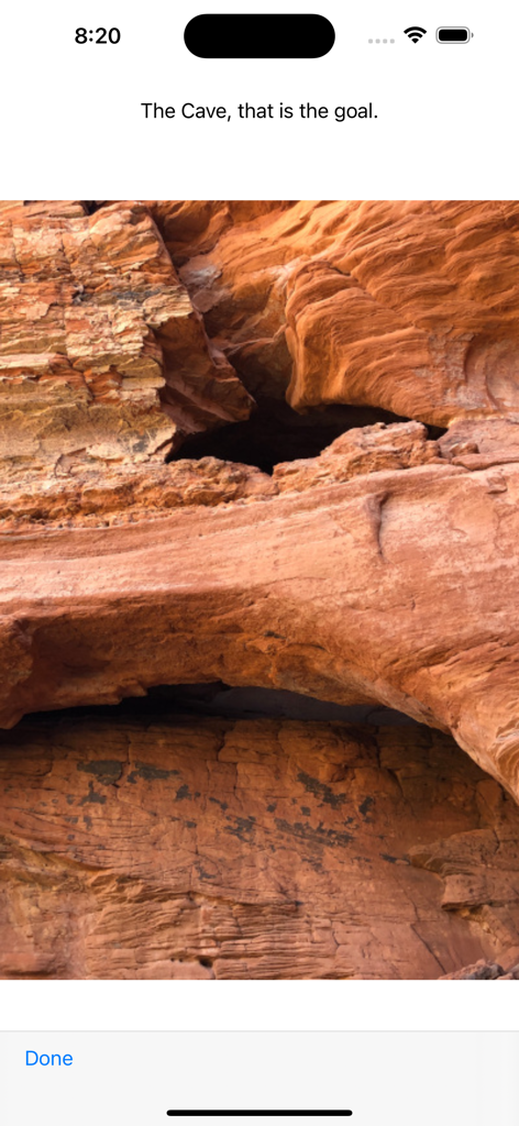 A photograph of a red rock cave in Sedona with text stating it is the hiking goal