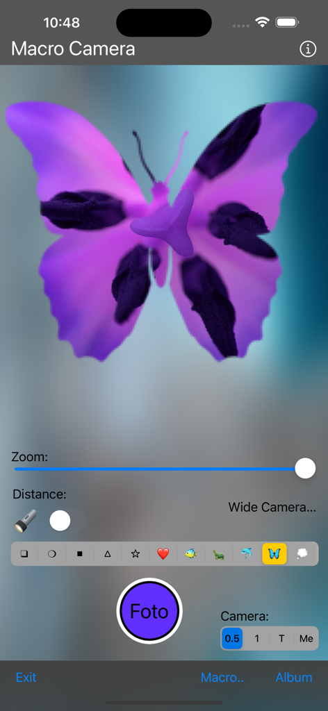 Macro-Camera - Interfaz de la aplicación Macro-Cámara que muestra una foto de primer plano de una mariposa con ajustes de zoom y distancia