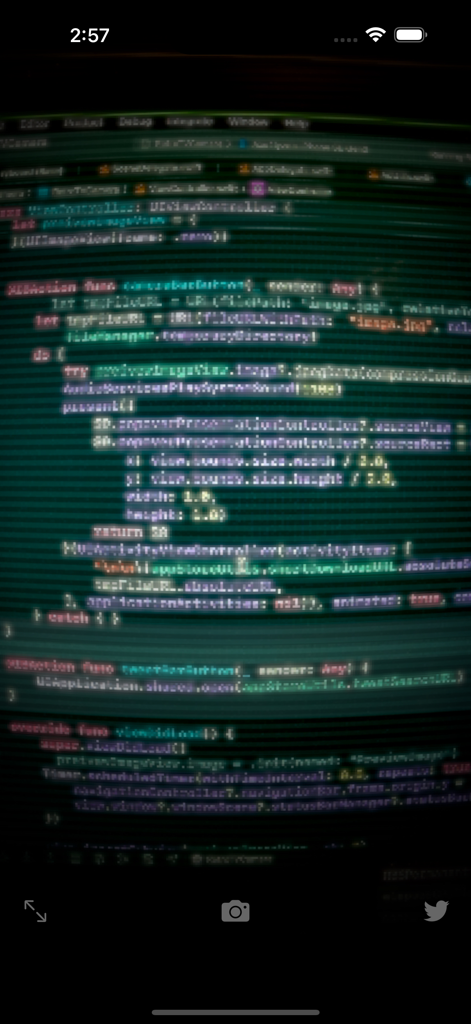 CRT Monitor FX :RetroTVCamera - Computer code displayed with a retro green CRT monitor glitch effect and scanlines.