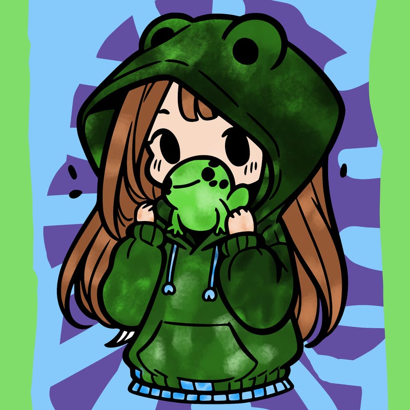 a girl holding a froggy hoodie