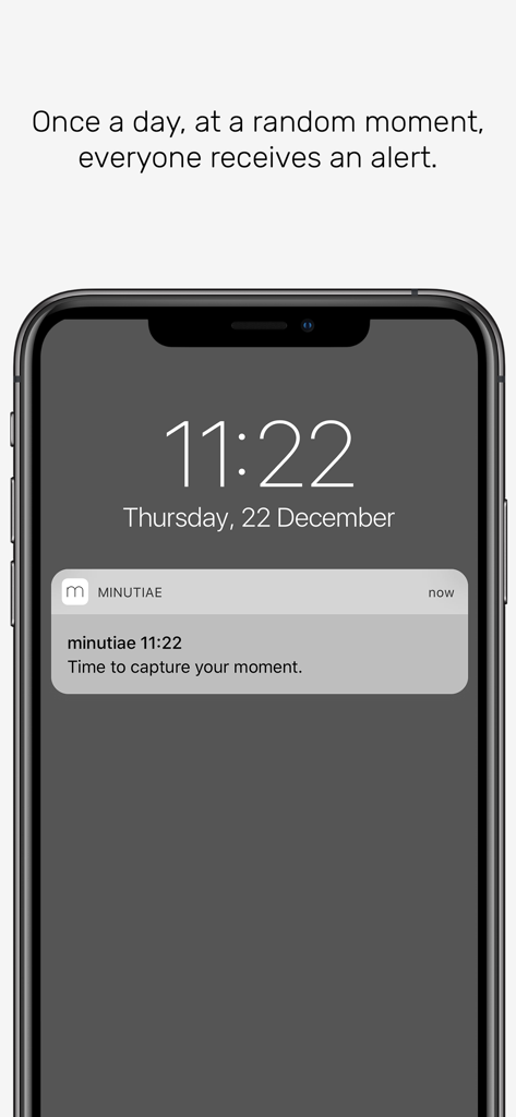 minutiae: Real Life - Smartphone-Sperrbildschirm mit einer täglichen zufälligen Benachrichtigung der minutiae App, um einen Moment festzuhalten.