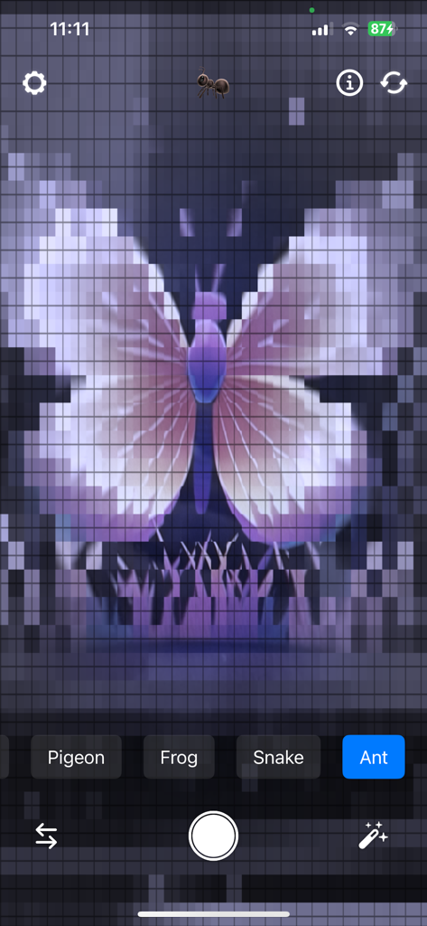 EyeShift app interface showing an ant vision simulation of a butterfly with a grid effect