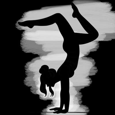 a woman doing a handstand