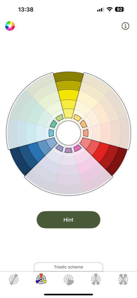 Tinto: Personal Color Wheel - Tintoアプリのインターフェースが、カラーホイール上に3分割法配色を表示している様子