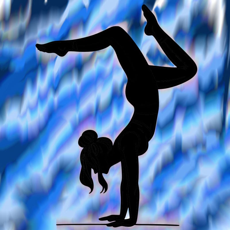 a woman doing a handstand