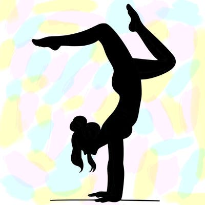 a woman doing a handstand