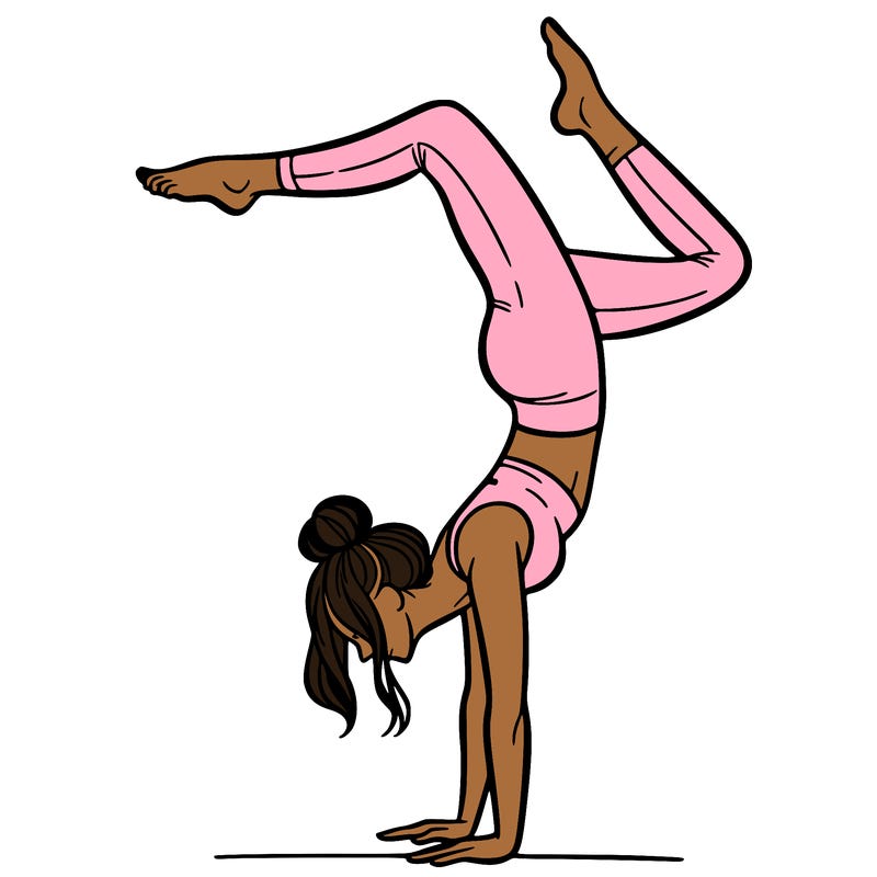 a woman doing a handstand