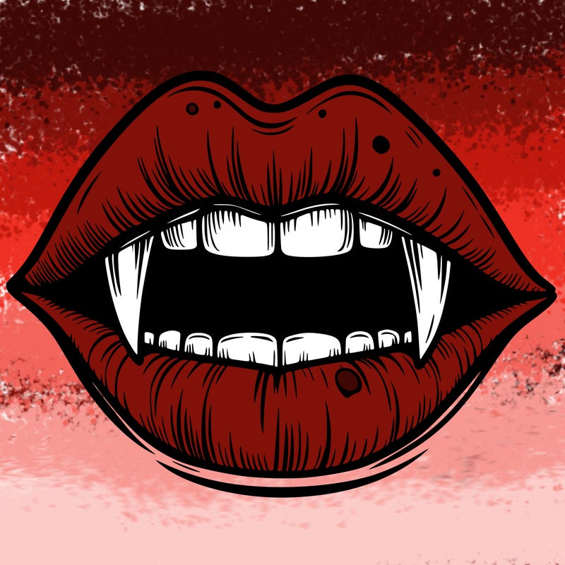 lips with vampire teeth