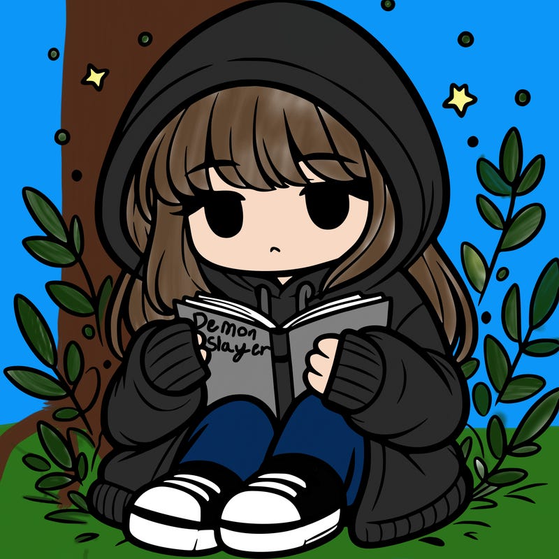 girl in oversized hoodie reading a book