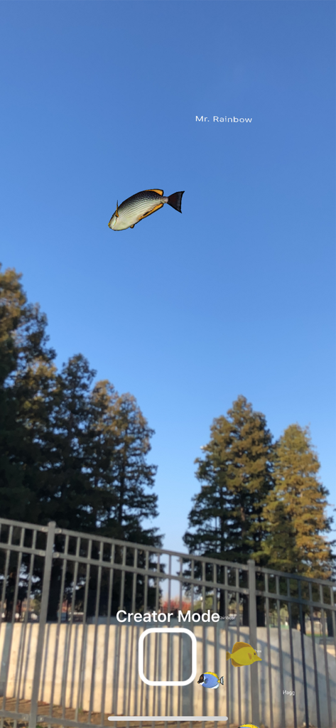 Magic Fish AR - Magic Fish AR creator mode showing a virtual fish floating in the sky