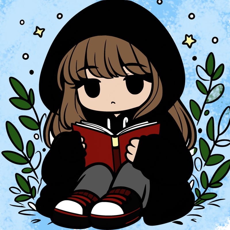 girl in oversized hoodie reading a book