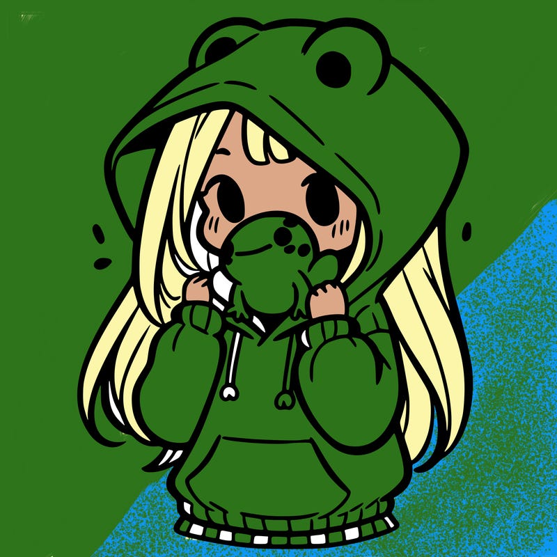 a girl holding a froggy hoodie
