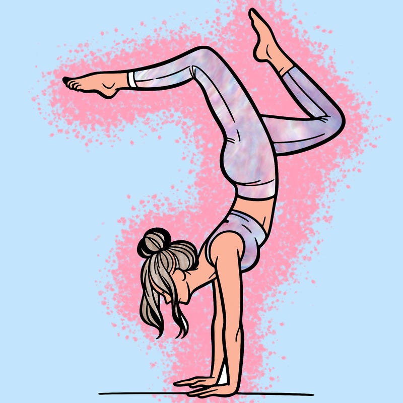 a woman doing a handstand