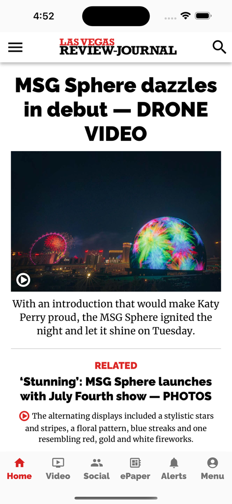 El feed de noticias de la aplicación móvil Las Vegas Review-Journal que muestra un artículo sobre el debut de la MSG Sphere con una foto colorida.