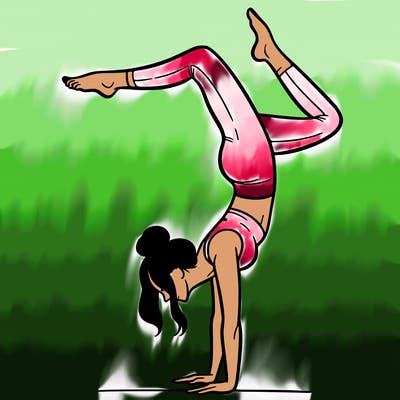 a woman doing a handstand