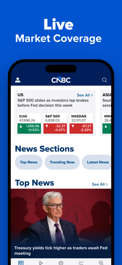 CNBC mobile app home screen showing stock market indices and financial news headlines
