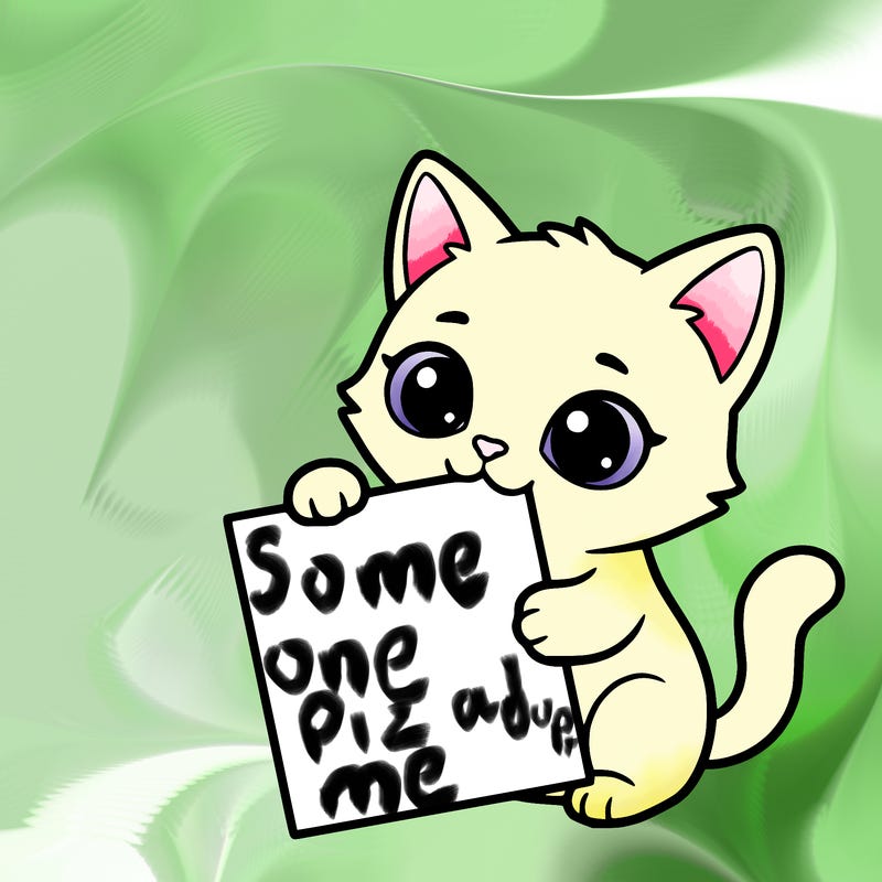 a small cat with a blank sheet of paper in its hand. the cat is sooooooo cute!