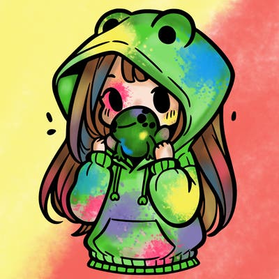 a girl holding a froggy hoodie