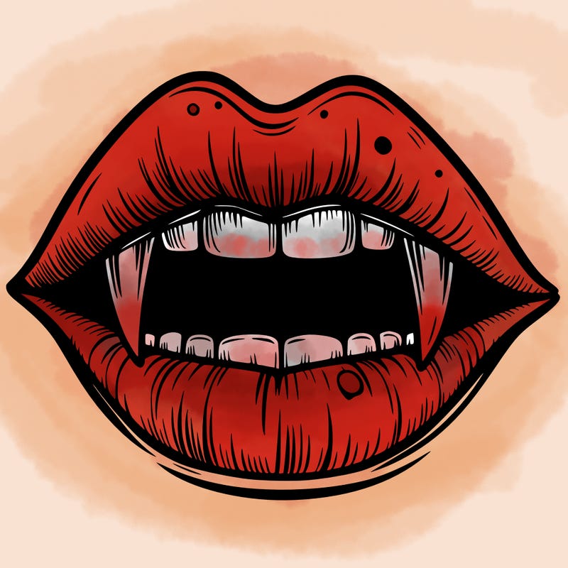 lips with vampire teeth