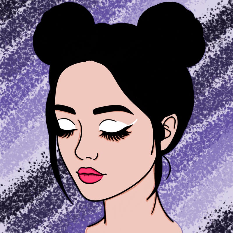 woman with hair buns