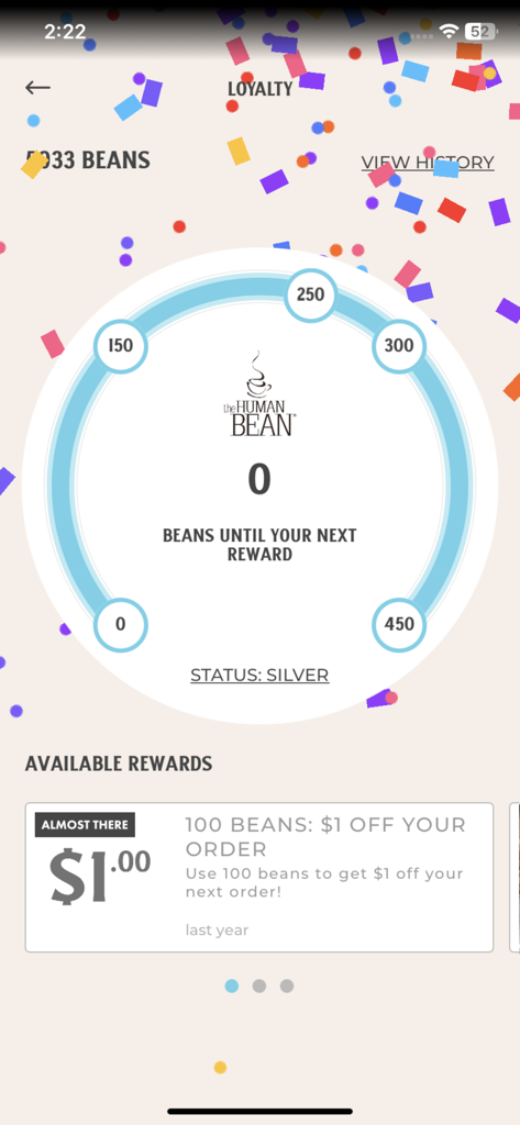 Tela de recompensas de fidelidade do aplicativo The Human Bean mostrando o progresso dos pontos de beans e o nível de status prata